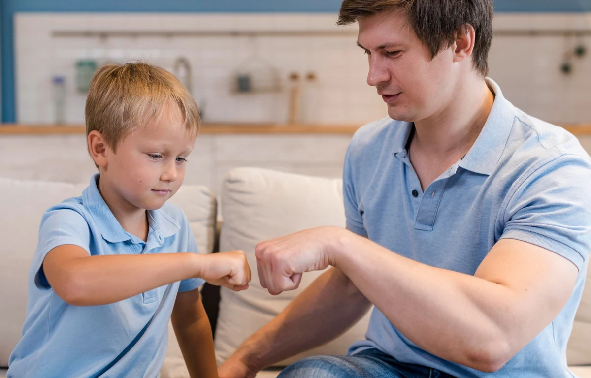 Co-regulation: father and son reconciling after a conflict